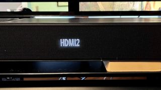 JBL 1300X soundbar front panel LED display showing HDMI input