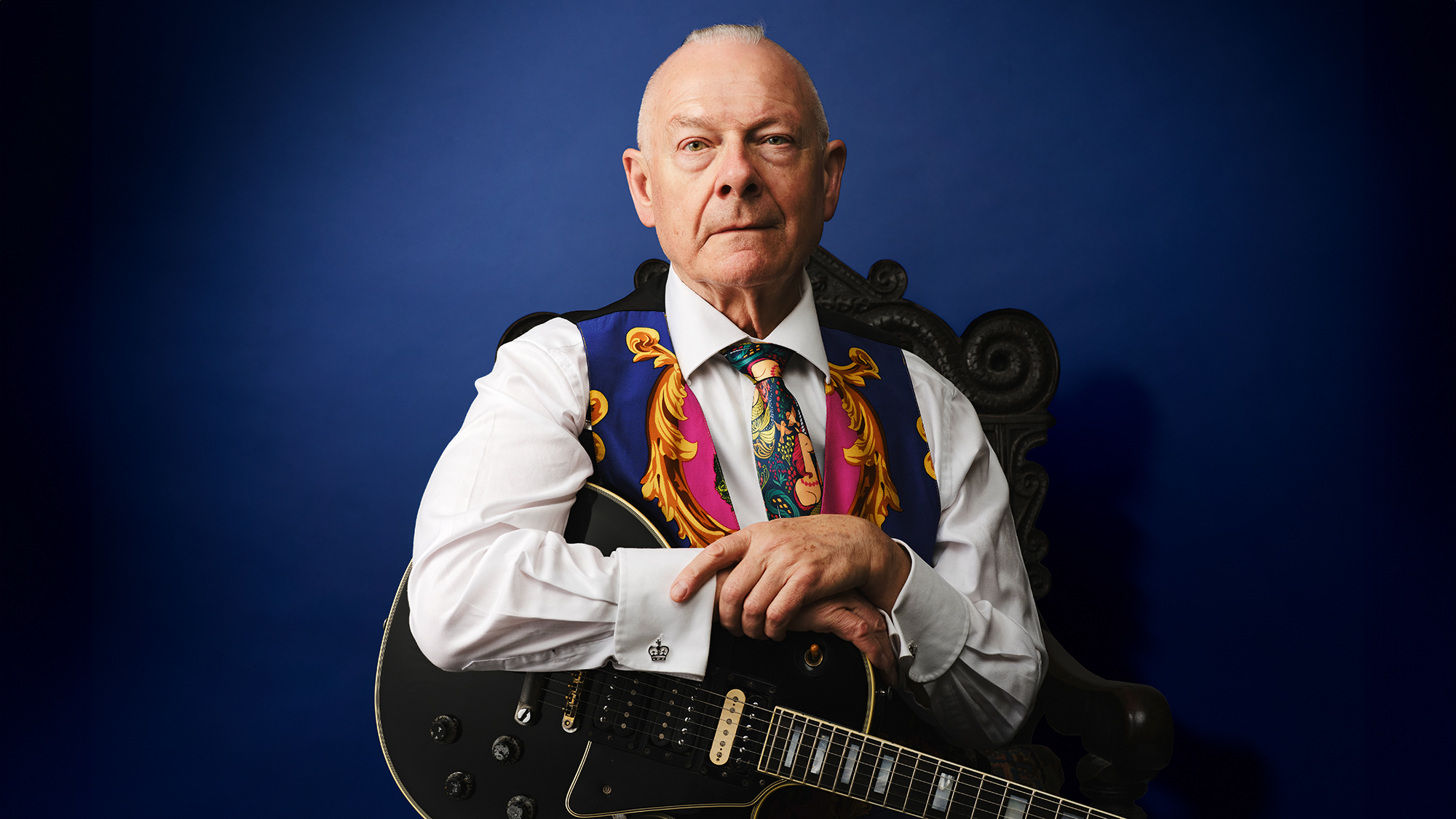 Robert Fripp photographed with his 1959 Gibson Les Paul Custom, the guitar behind much of his early groundbreaking work, in 2022. 