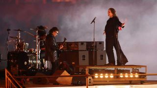 Ozzy Osbourne and Tony Iommi onstage at the closing ceremony