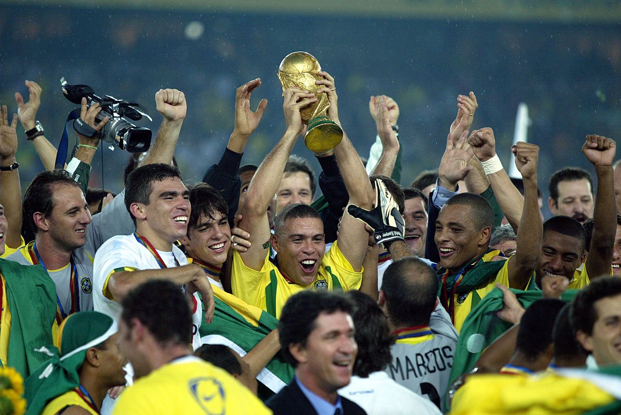 Ronaldo of Brazil lifts the World Cup trophy following his side's victory over Germany in the 2002 final