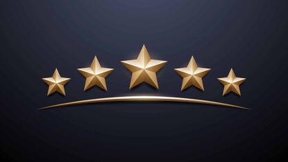 five gold stars on black background