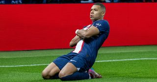 Kylian Mbappe of Paris Saint-Germain celebrates after scoring the opening goal during the UEFA Champions League group H match between Paris Saint-Germain and SL Benfica at Parc des Princes on October 11, 2022 in Paris, France.