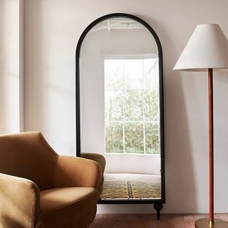 curved wall mirror in black