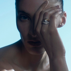 a woman carrying a chanel bag