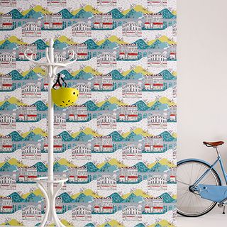 room with wallpaper and cycle