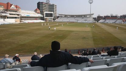 NOTTINGHAM, ENGLAND - APRIL 10:Spectators, on the opening day of the county cricket season, look on during the LV County Championship division one match between Nottinghamshire and Middlesex 