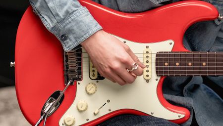 A photo of the Fender American Ultra Luxe Vintage &rsquo;60s Stratocaster HSS in Fiesta Red