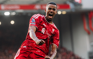 Alexander Isak of Liverpool celebrates scoring against Brighton