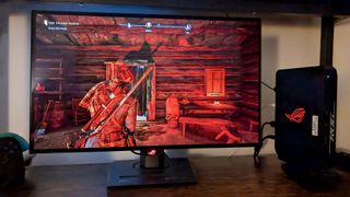 ASUS ROG Strix OLED 27-inch XG27AQDMG at night.