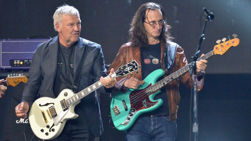 2013 Inductees Alex Lifeson and Geddy Lee of Rush perform onstage at the 32nd Annual Rock &amp; Roll Hall Of Fame