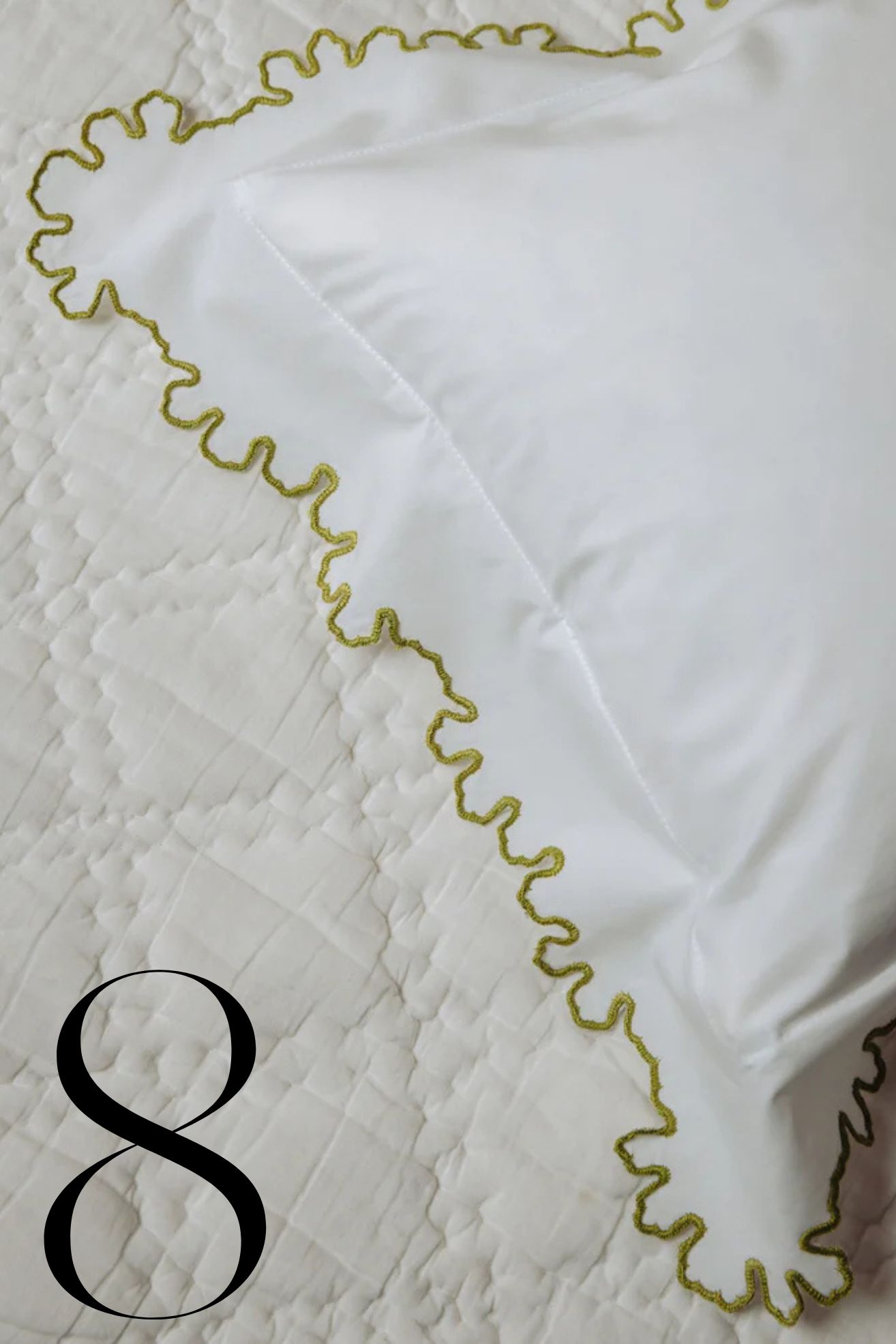 white pillowcase with decorative chartreuse trim