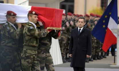 French President Sarkozy pays tribute to a paratrooper killed by a motorcycle-riding gunman last week: The suspect is a Muslim who claims ties to al Qaeda.