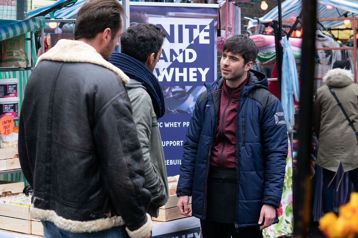 Leo King is confronted by Martin Fowler and Kush Kazemi in EastEnders