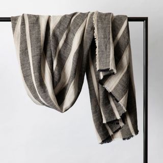 gray and beige striped linen throw