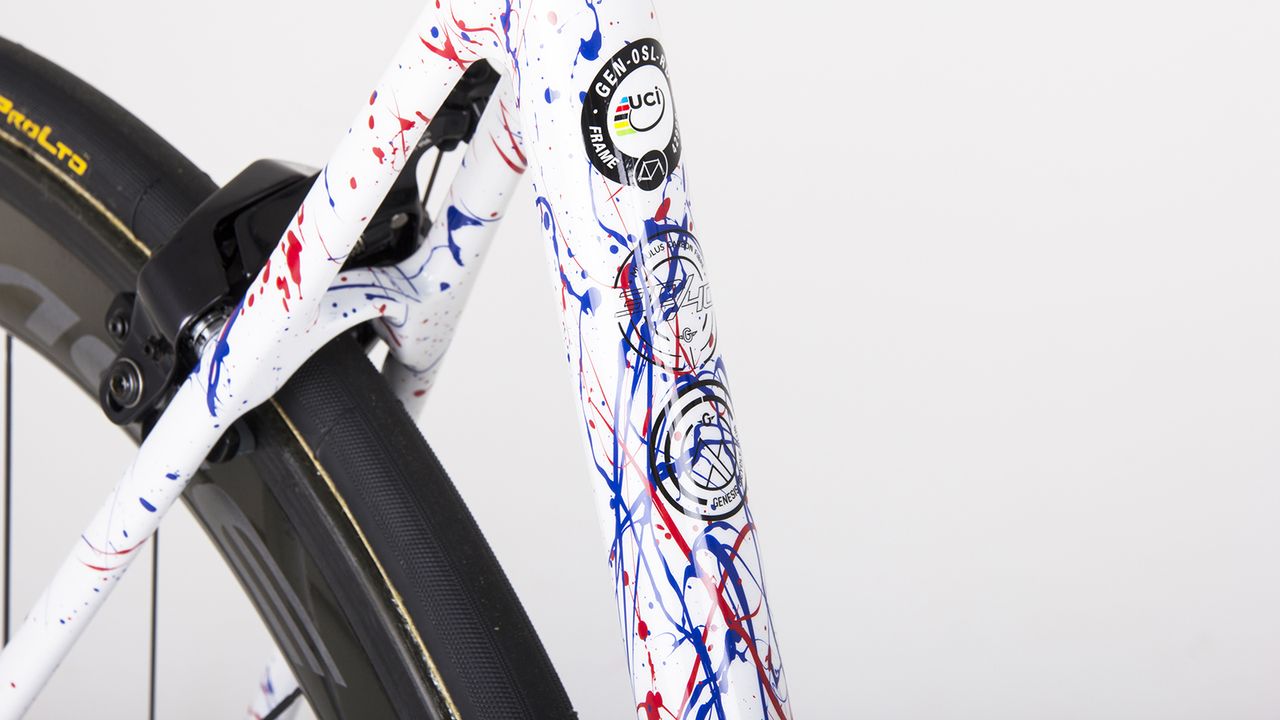 Standard frameset decals are retained on the seat tube but almost lost among the design