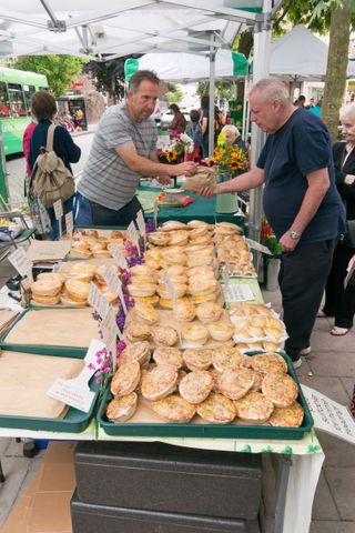 A pie stall at Exeter farmer's market, Devon