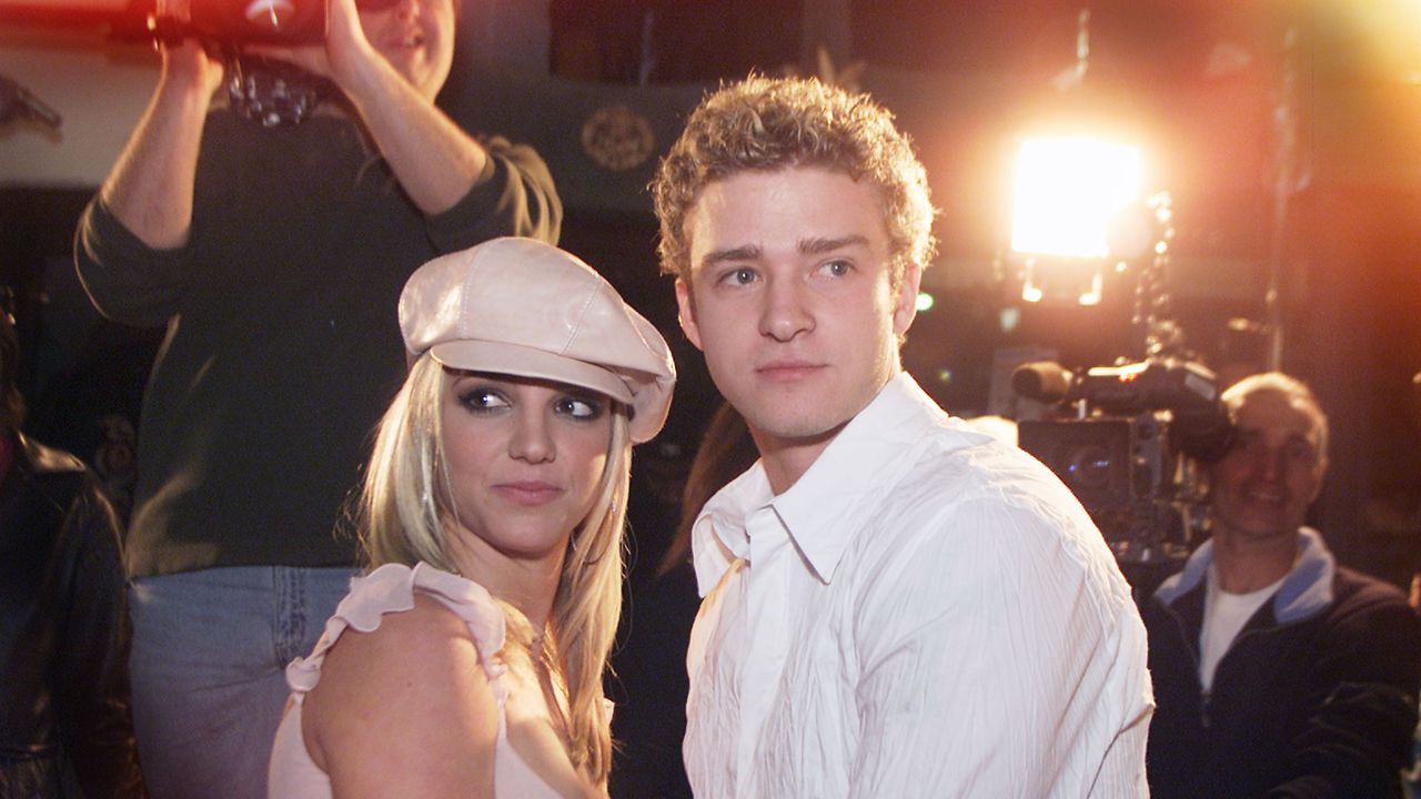 britney spears and boyfriend justin timberlake arrive at the premiere of her movie crossroads at the mann chinese theatre in hollywood, ca, feb 11, 2002 photo by kevin wintergetty images