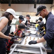 Meghan Markle and Prince Harry volunteering