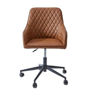 A tan faux leather chair with crosshatch pattern