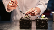 Pichaya “Pam” Soontornyanakij, chef and founder of her restaurant Potong in Bangkok, preparing a dish