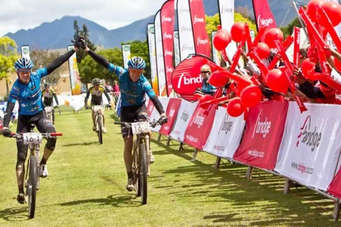 Nico Bell (left) and Gawie Combrinck of Team Westvaal Columbia celebrate taking the win on Stage 4 of the 2012 Cape Pioneer Trek. They have been named as the official winners of Stages 1, 4, 5 and 6 as well as the overall winners.