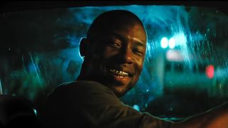 Black (Trevante Rhodes) smiling in Moonlight