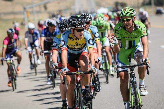 Riders have a chat at the front of the field after the break goes up the road