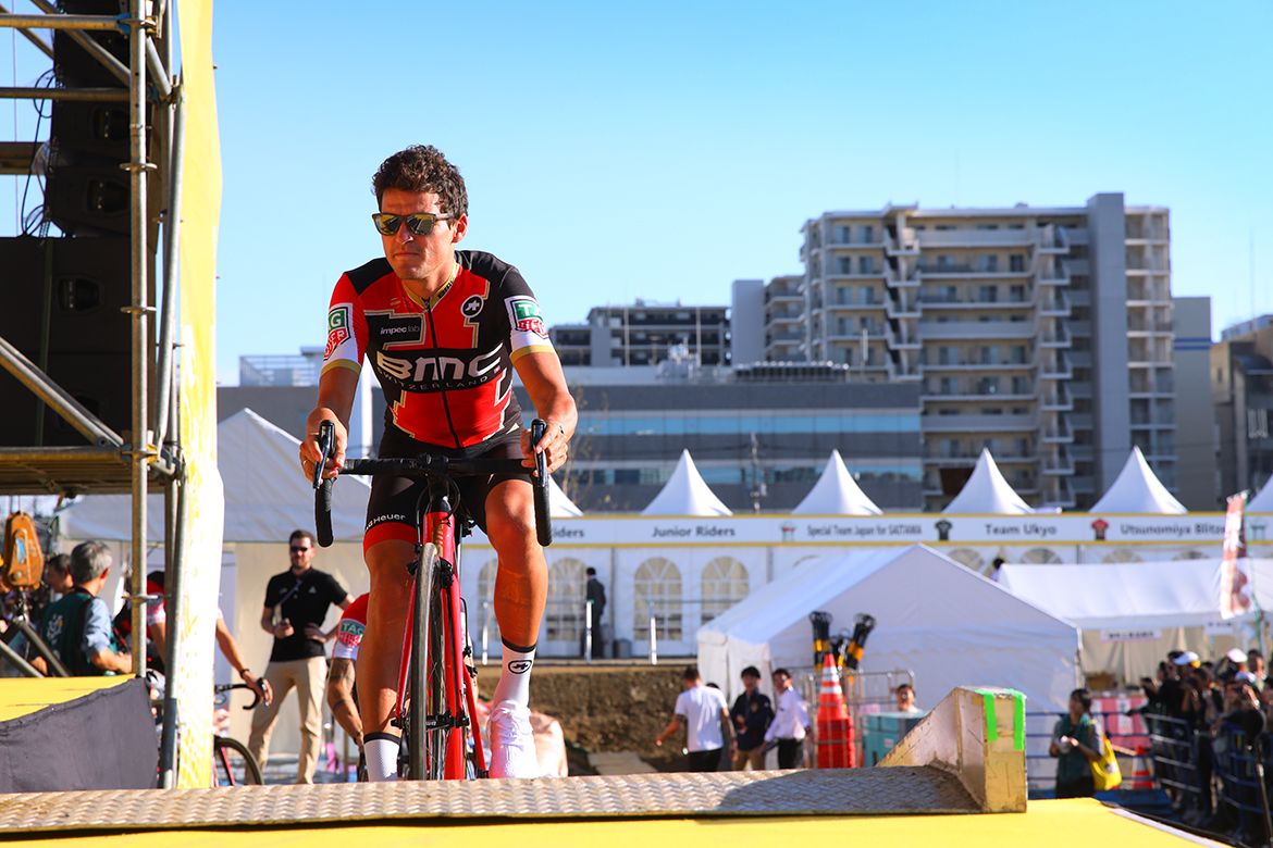 Greg Van Avermaet rides onto the stage