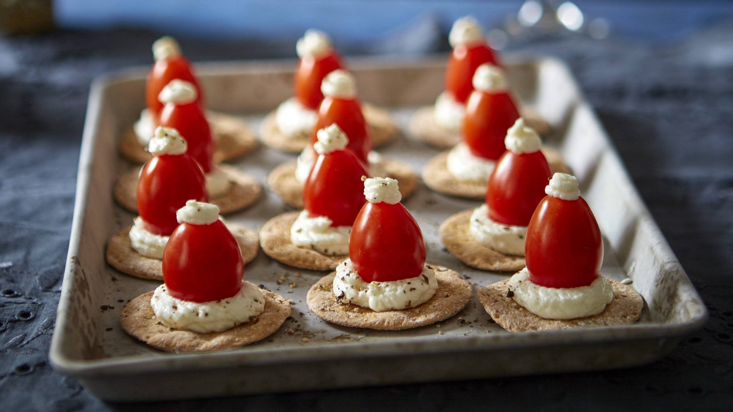 Tomato and cream cheese Santa hat recipe