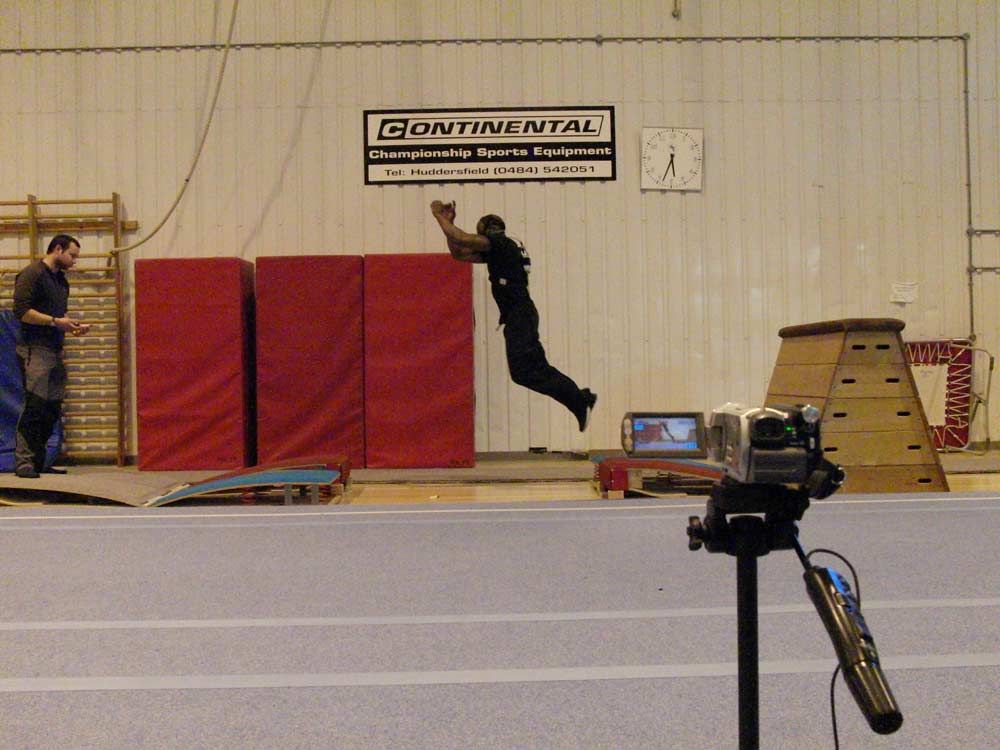 Parkour athletes mimic orangutan-jumping behavior between compliant platforms. 