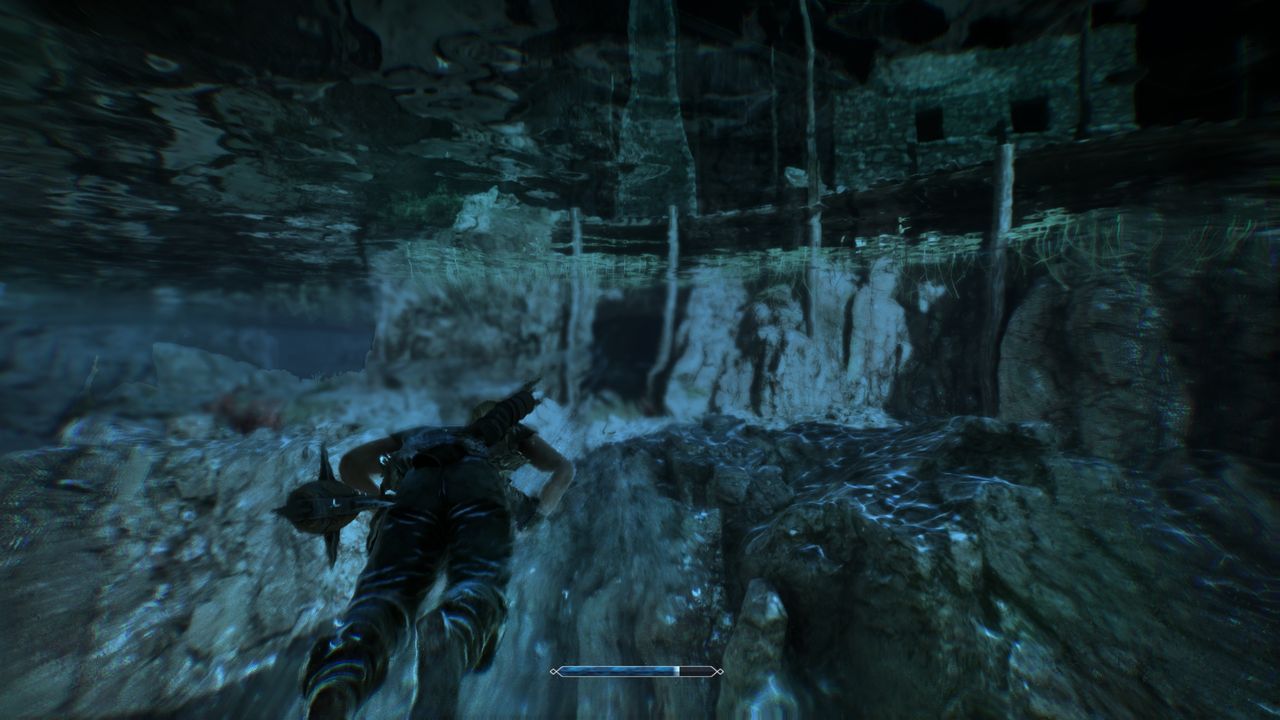 Gothic Remake New Camp: A player diving underneath the tavern, into a cave opening.
