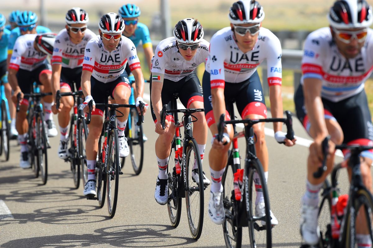 The UAE Team Emirates squad protects Tadej Pogacar