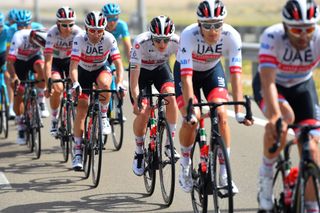 The UAE Team Emirates squad protects Tadej Pogacar