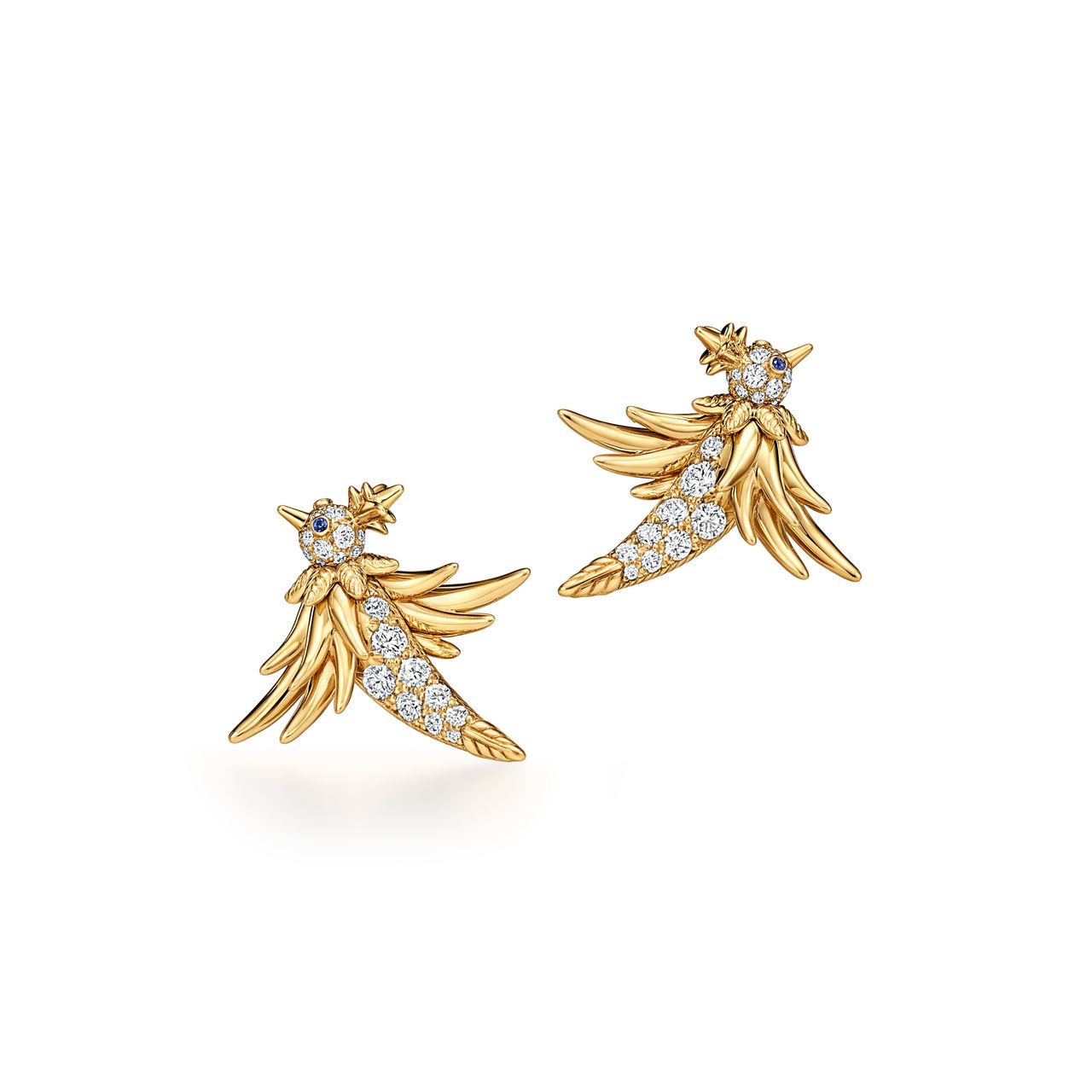 Gold and diamond stud earrings in the shape of a bird in flight
