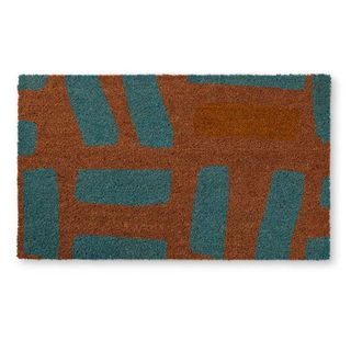 Oliver Bonas Stix Doormat with an abstract blue design against a natural base