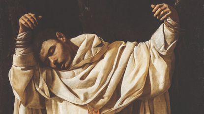 Saint Serapion hanging limp in chains