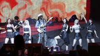 Nile Rodgers playing guitar with Le Sserafim at Coachella