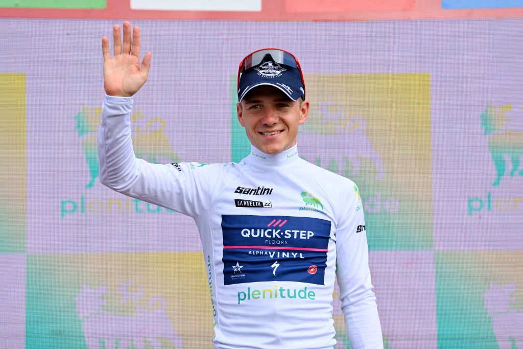 CISTIERNA SPAIN AUGUST 26 Remco Evenepoel of Belgium and Team QuickStep Alpha Vinyl celebrates at podium as White Best Young Rider Jersey winner during the 77th Tour of Spain 2022 Stage 7 a 190km stage from Camargo to Cistierna LaVuelta22 WorldTour on August 26 2022 in Cistierna Spain Photo by Justin SetterfieldGetty Images