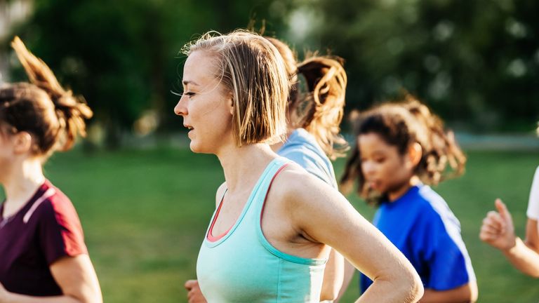 Woman running with friends