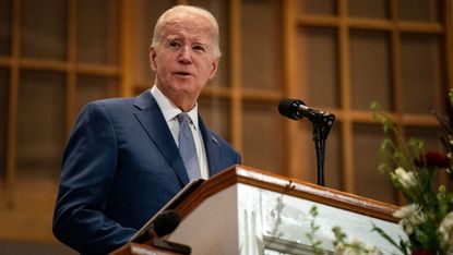 Joe Biden speaking in a church
