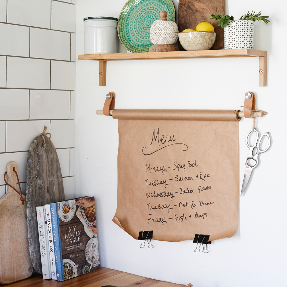 white kitchen wall with shelf and books