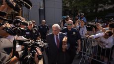 Senator Robert Menendez, a Democrat from New Jersey, center, exits federal court in New York