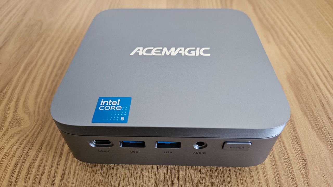 The Acemagic Kron Mini K5 PC on a desk