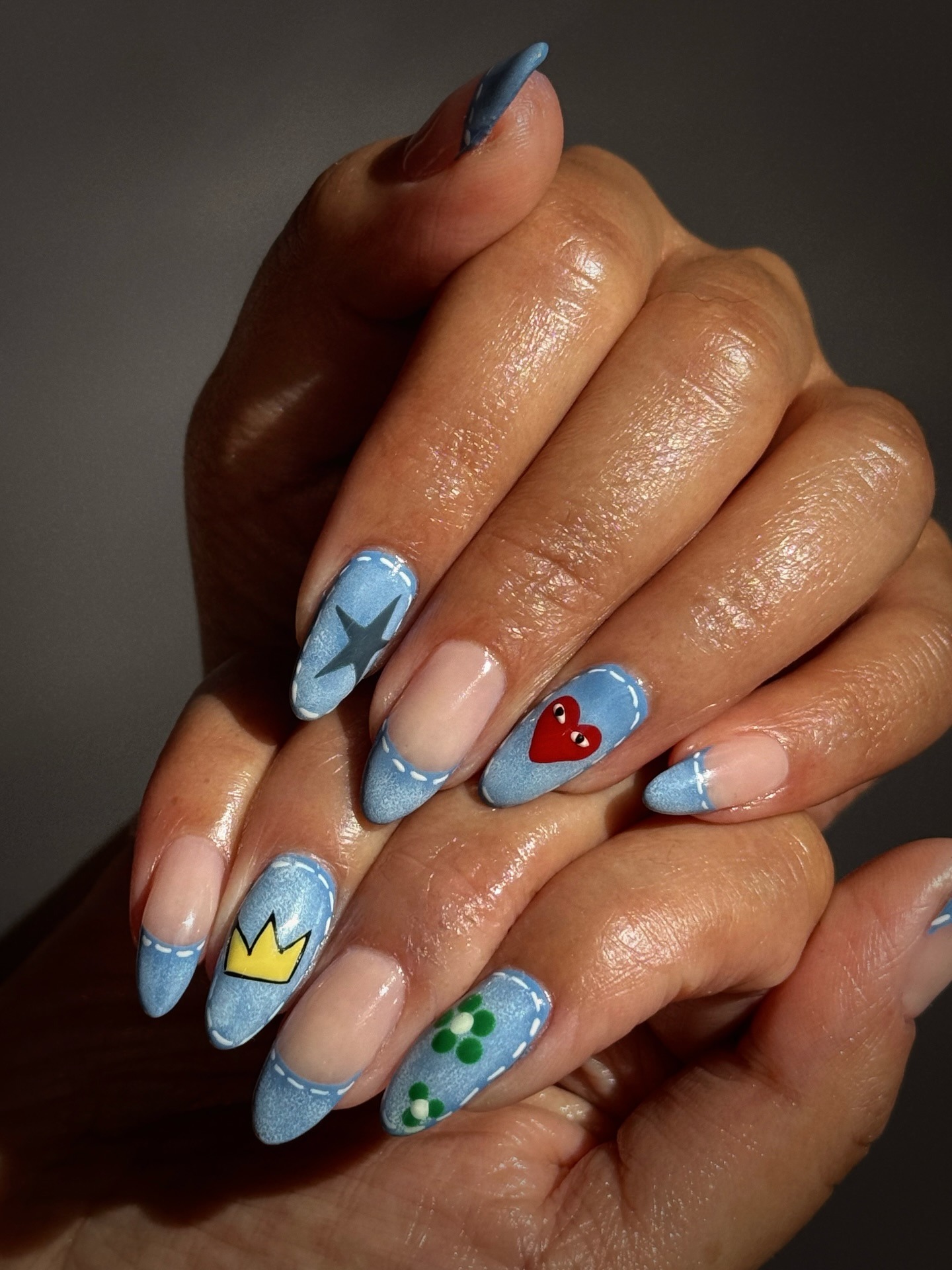 A denim manicure with micro nail art on top