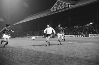 Fulham 1 v AS Roma 1. Anglo-Italian Cup Group 2 match held at Craven Cottage Pictured Fulham striker Steve Earle (centre) chases down the ball. 21st March 1973