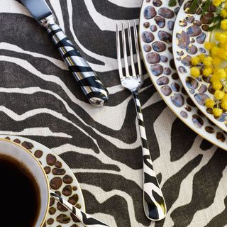 dinning table fork and plates with animal print