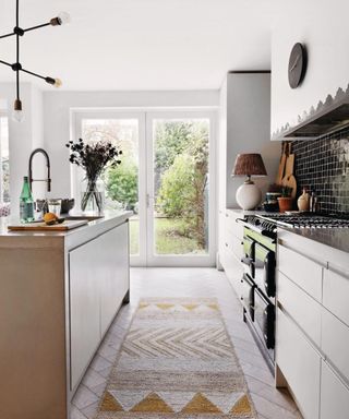 neutral modern kitchen with off white cabinets