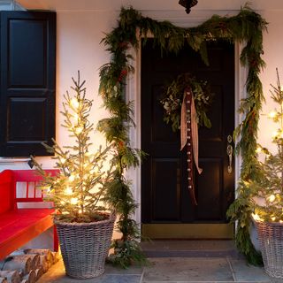 front door porch Christmas decorations sleigh bells
