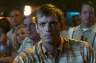 Joel Kinnaman (at center) plays astronaut Ed Baldwin, commander of the Apollo 10 mission, in "For All Mankind."