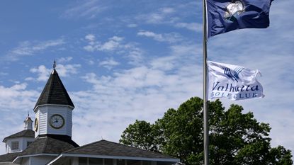 Flags flutter in the breeze near the Valhalla clubhouse